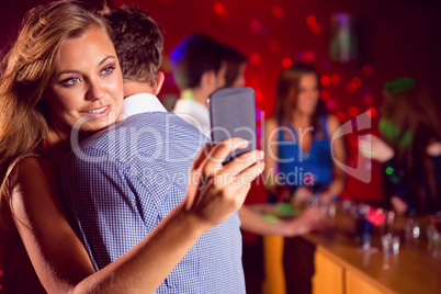 Cute couple slow dancing together