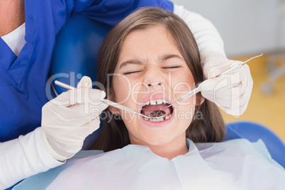 Portrait of a scared young patient in dental examination