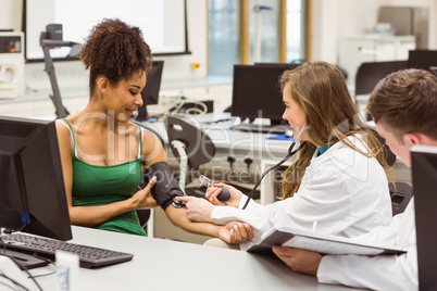 Medical students working together in the lab