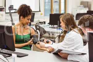 Medical students working together in the lab