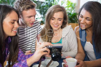 Young students looking at a camera