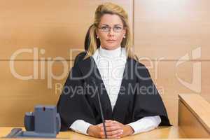 Stern judge looking at camera