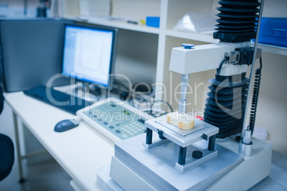 Machine analysing slice of bread with computer