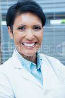 Portrait of smiling female dentist