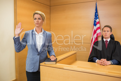 Witness taking an oath