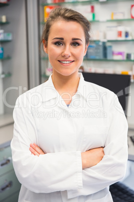 Junior pharmacist smiling at camera