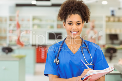 Young medical student smiling at camera