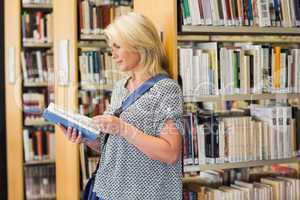 Mature student studying in the library