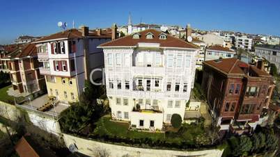 Flying over luxury Istanbul houses on a sunny day