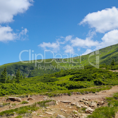 mountain slopes and blue sky
