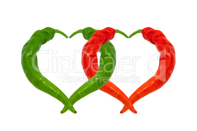 Red and green chili peppers in love