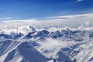 Snow plateau and sunlight sky with clouds in evening