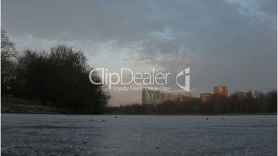 Winter pond and clouds (time-lapse)