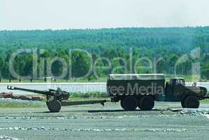 army truck transports a gun