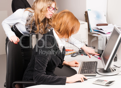 Businesswomen working with computer