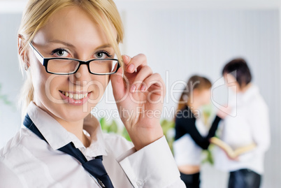 Young business lady in office