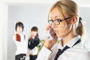 Calling attractive woman at colleagues background