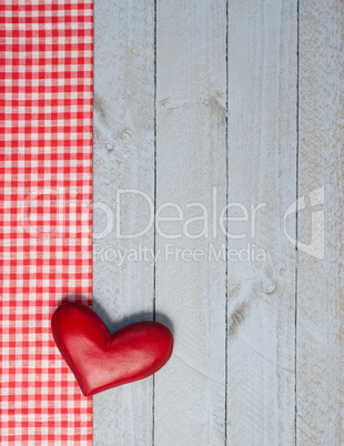 Red Heart on wooden background