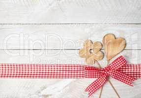 Flower and Heart on wooden background