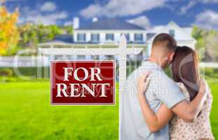 For Rent Real Estate Sign, Military Couple Looking at House