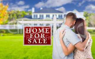 For Sale Real Estate Sign, Military Couple Looking at House