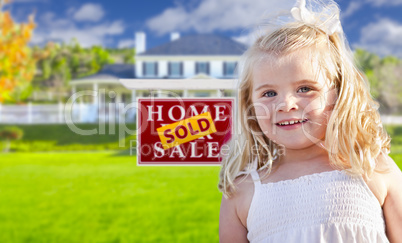 Girl in Yard with Sold Real Estate Sign and House