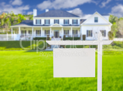 Blank Real Estate Sign in Front of New House