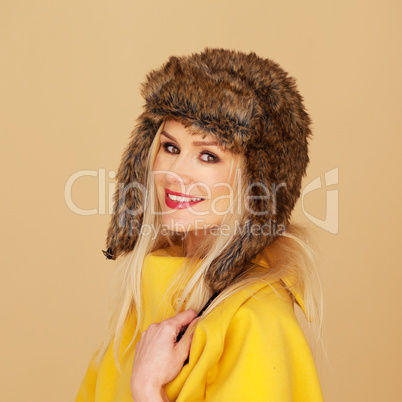 Pretty young woman in stylish winter fashion