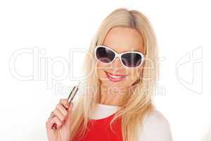Pretty blond woman holding an e-cigarette