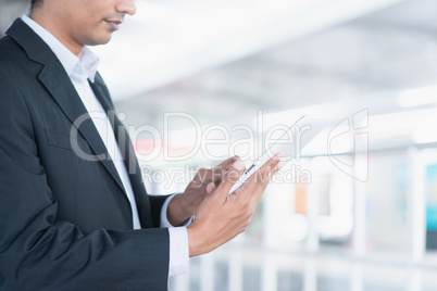 Indian business people using tablet computer