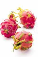 Three Whole Dragonfruits On White Background