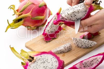Cutting Pitaya Fruit Flesh Off Its Purple Skin