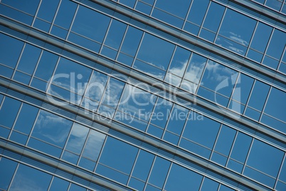 Angled view of cloud reflected in windows