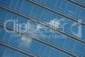 Angled view of cloud reflected in windows