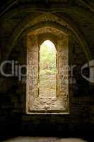 Arched window and vaulting in Battle Abbey