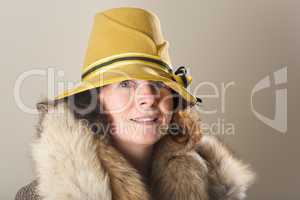 Brunette in yellow felt hat and fur