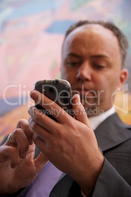 Businessman using mobile phone 2