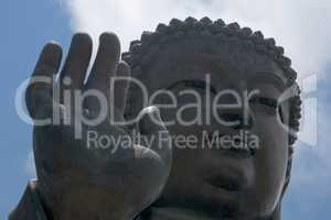 Close-up of Big Buddha hand and face