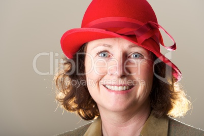 Close-up of brunette in red felt hat