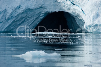 Close-up of cave in Arctic ice cliff