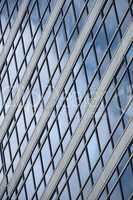 Geometric pattern of windows on glass facade
