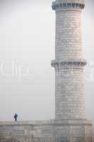 Man photographing Taj minaret