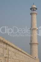 Man standing next to Taj minaret