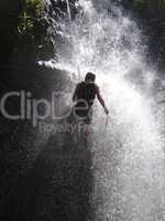 Nick Dale abseiling down a Kenyan waterfall