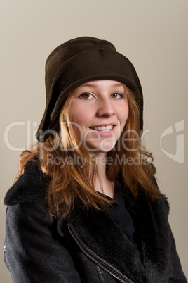 Redhead in cloche hat and leather jacket