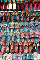 Rows of shoes at Indian stall