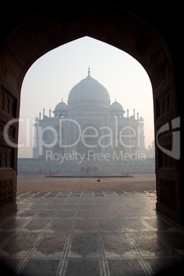 Taj Mahal framed in mosque arch