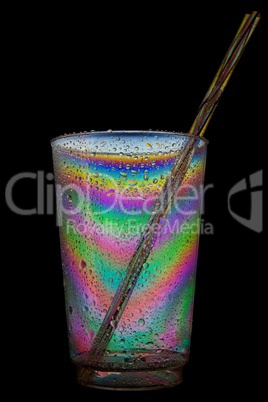 Wet glass with straws (cross-polarised)