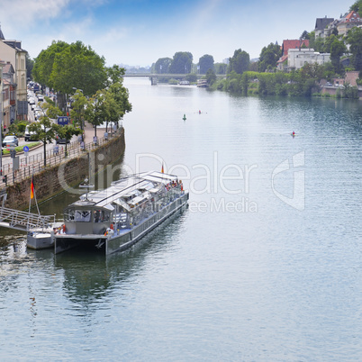 navigable river, urban promenade and pleasure vessel