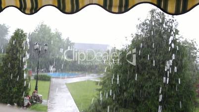 Rain in the yard with swimming pool